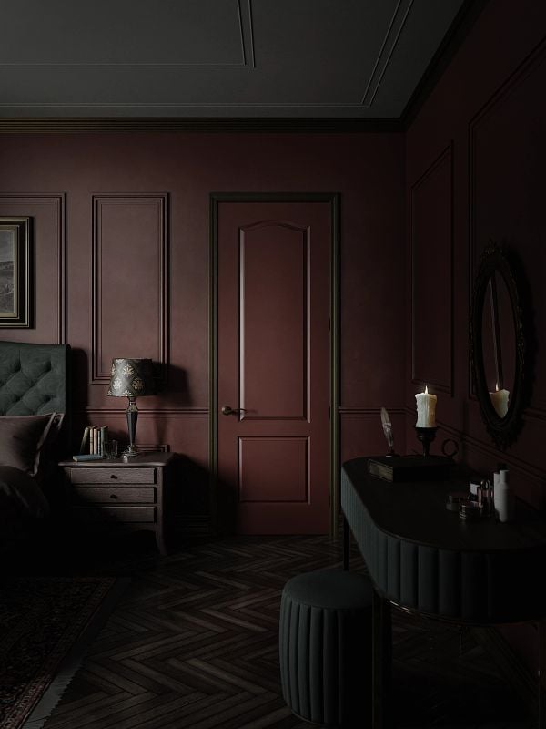 a deep red solid core 2 panel door in a master bedroom following the dark academia interior design trend